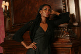 Sexy pretty woman wearing CharmaineLouise Intimates CLIntimates Lena black cashmere crochet sweaterlette sweater cardigan evening dress