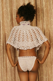 Sexy pretty woman wearing CharmaineLouise Intimates CLIntimates Ginger purple cashmere silk crochet cape capelet purple crochet strapless bra purple crochet string bikini panties