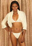 Sexy pretty woman with long black hair wearing CharmaineLouise Intimates CLIntimates Lena cream cashmere sweaterlette sweater cardigan crochet bra crochet string bikini