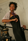 Sexy pretty woman wearing CharmaineLouise Intimates CLIntimates Ginger purple silk crochet cape capelet strapless black dress